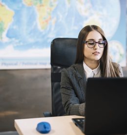 business-woman-using-laptop-table